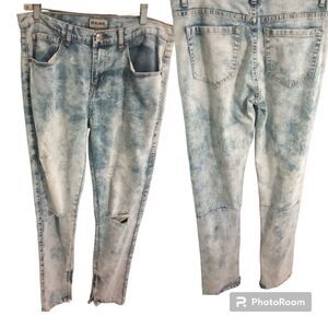 Black skinny flex distressed jeans with zipper hem